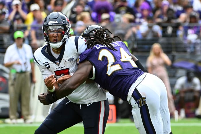 Houston Texans quarterback C.J. Stroud (7) is pressured by Baltimore Ravens linebacker Jadeveon Clowney (24) during the second half at M&T Bank Stadium.